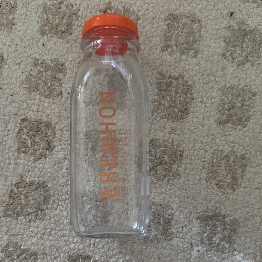 Erewhon x Base reusable Glass Bottle with Orange Cap